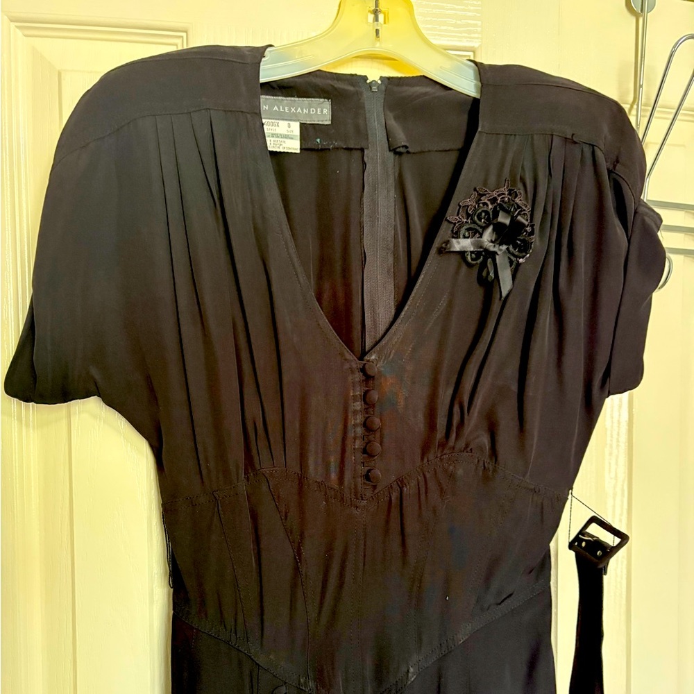 Lovely vintage gown, slightly padded shoulders, short sleeves, flared skirt